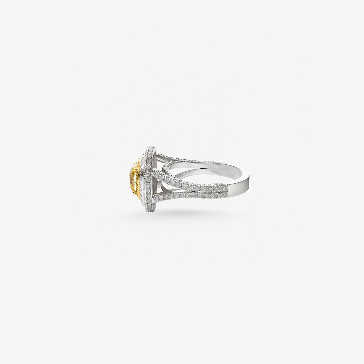 Peter Marco 18k two-tone white and yellow gold cushion cut yellow diamond and round cut diamond halo ring, side view