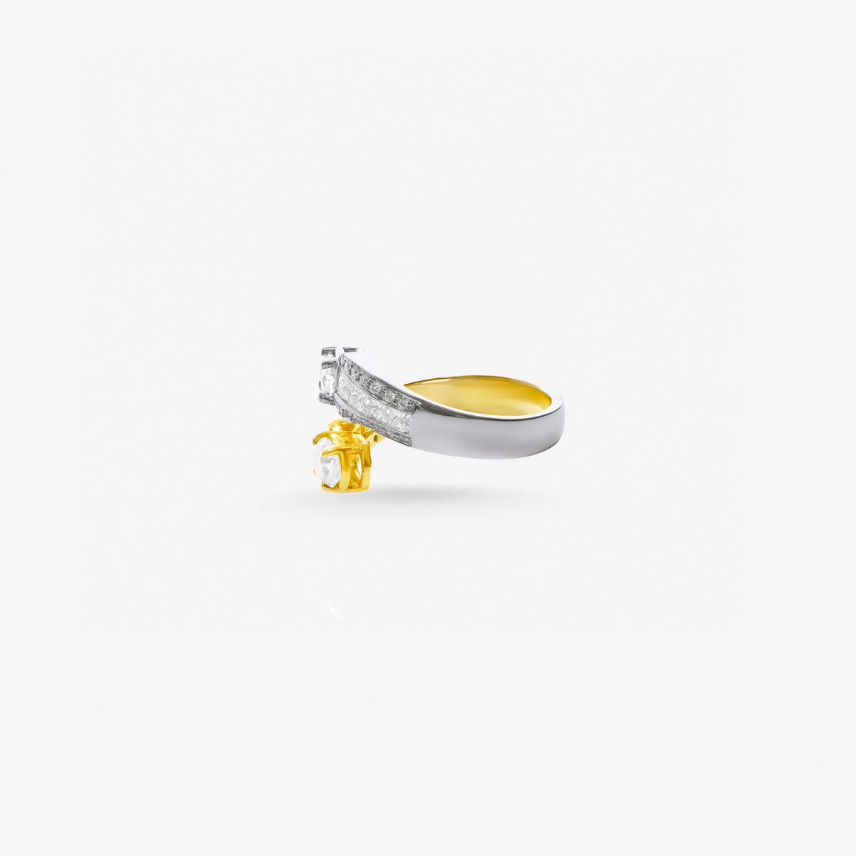 Peter Marco 18k two-tone white and yellow gold emerald, princess and round cut diamond open ring, side view