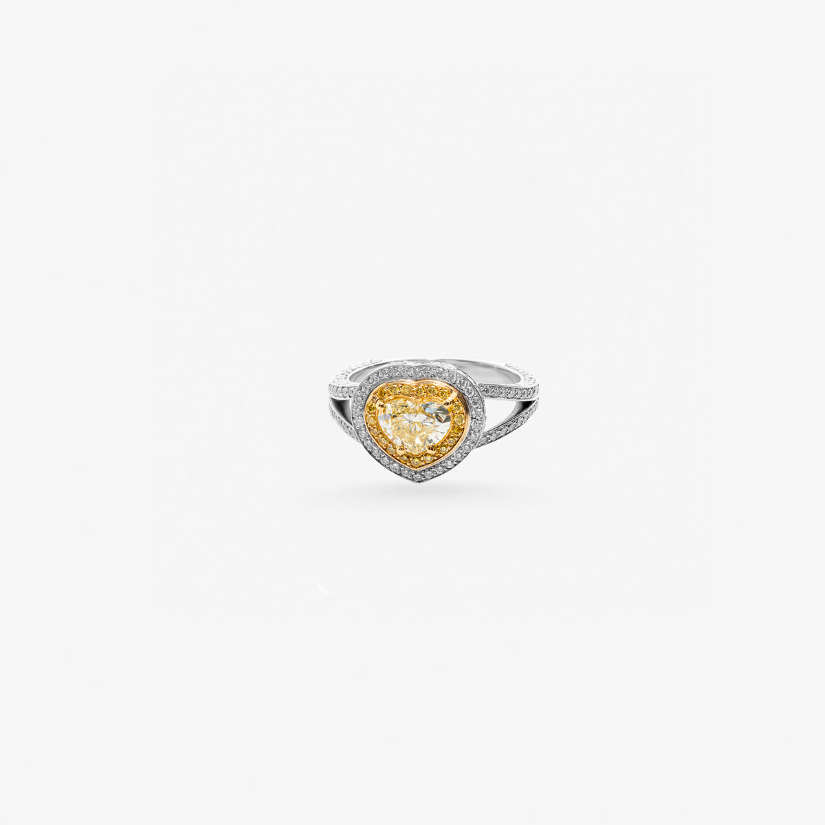 Peter Marco 18k two-tone white and yellow gold heart cut yellow diamond and round cut diamond halo ring