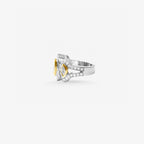 Peter Marco 18k two-tone white and yellow gold marquise cut and round cut diamond ring, side view