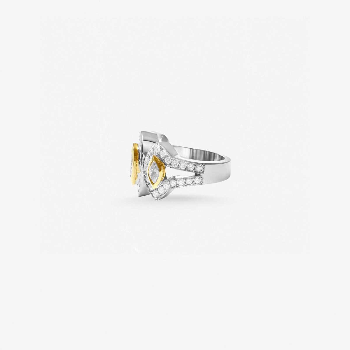 Peter Marco 18k two-tone white and yellow gold marquise cut and round cut diamond ring, side view