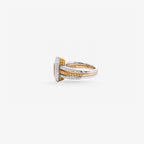 Peter Marco 18k two-tone white and yellow gold marquise cut golden brown zircon and round cut diamond ring, side view