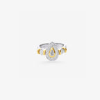 Peter Marco 18k two-tone white and yellow gold pear cut, princess and round cut diamond ring