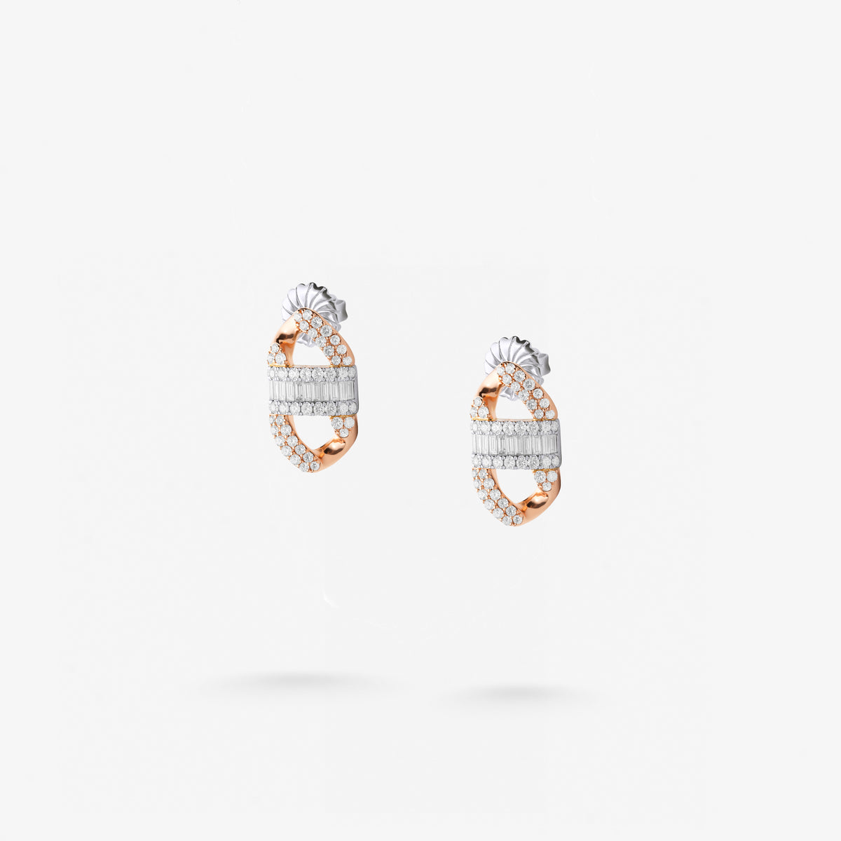 Peter Marco 18k white and rose gold baguette and round cut diamond drop earrings