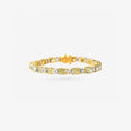 Peter Marco 18k white and yellow gold baguette cut diamond and cushion cut yellow diamond bracelet