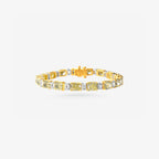 Peter Marco 18k white and yellow gold baguette cut diamond and cushion cut yellow diamond bracelet