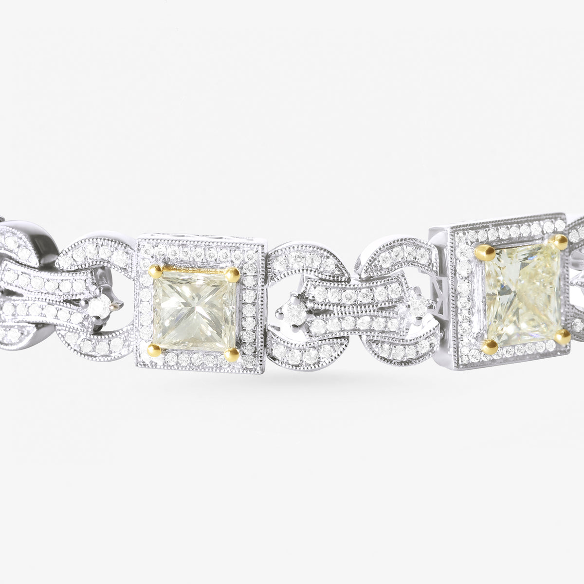 Peter Marco 18k white and yellow gold bezel set princess cut diamond bracelet, deatil view