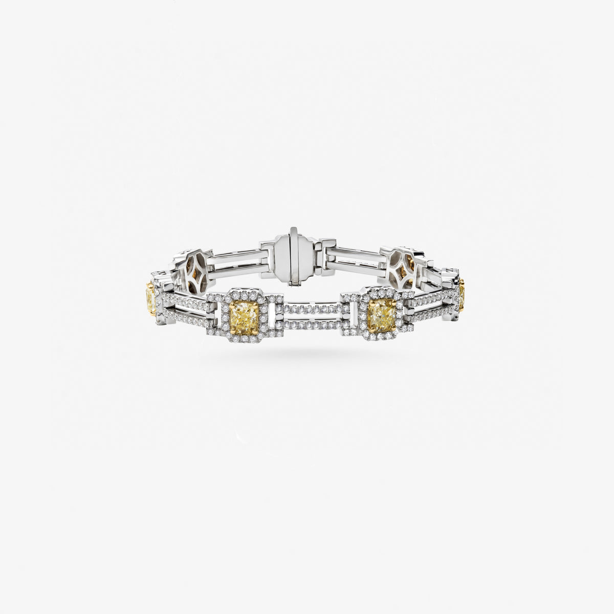 Peter Marco 18k white and yellow gold round cut diamond and cushion cut yellow diamond bracelet