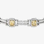 Peter Marco 18k white and yellow gold round cut diamond and cushion cut yellow diamond bracelet, detail view
