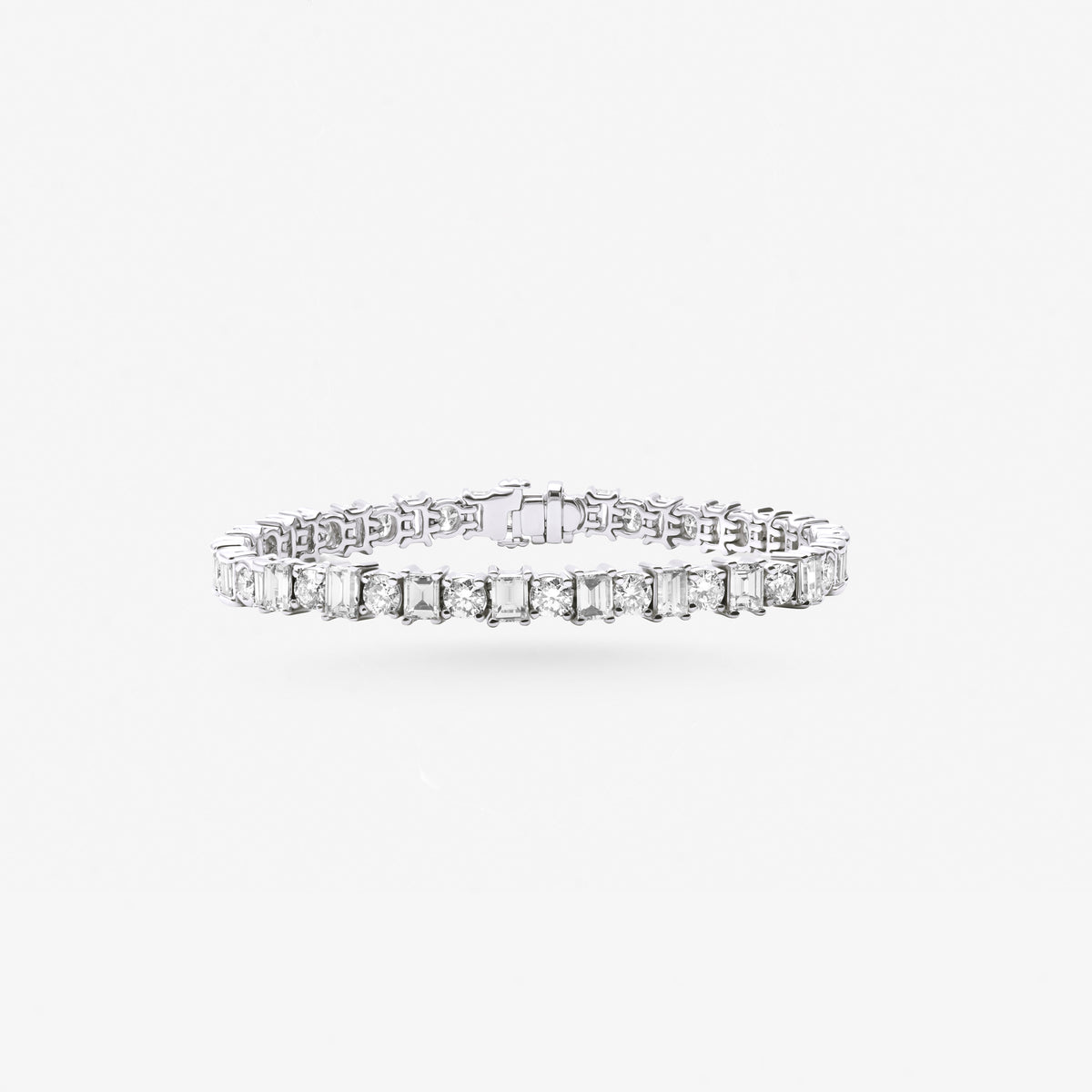 Peter Marco 18k white gold emerald cut and round cut diamond bracelet