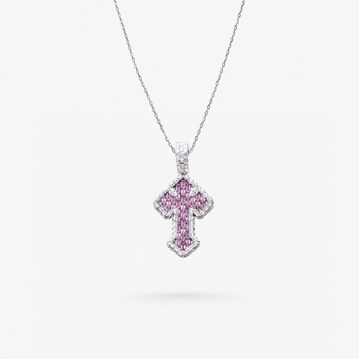 Peter Marco 18k white gold emerald cut diamond and pink sapphire cross pendant