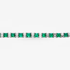 Peter Marco 18k white gold emerald cut emerald and baguette cut diamond , detail view