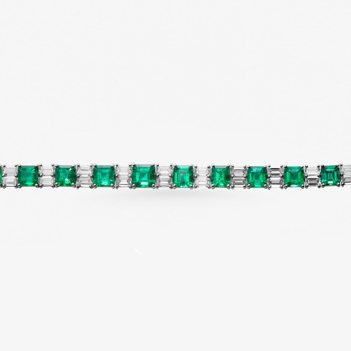 Peter Marco 18k white gold emerald cut emerald and baguette cut diamond , detail view