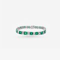 Peter Marco 18k white gold emerald cut emerald and baguette cut diamond bangle