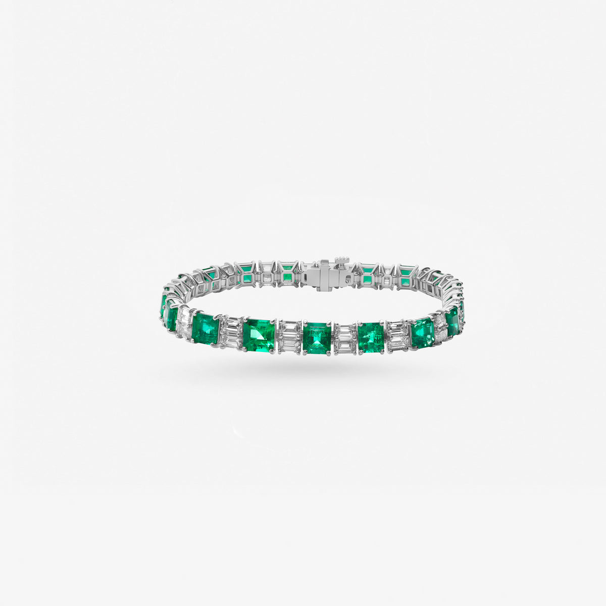 Peter Marco 18k white gold emerald cut emerald and baguette cut diamond bangle