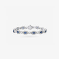 Peter Marco 18k white gold oval sapphire and round cut diamond link bracelet