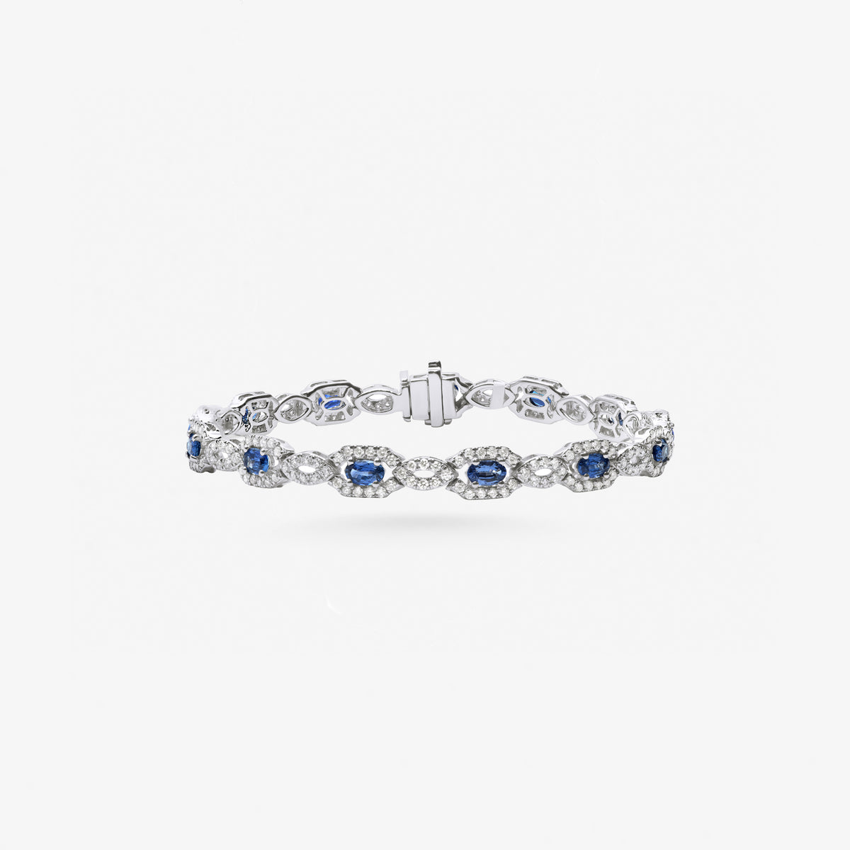 Peter Marco 18k white gold oval sapphire and round cut diamond link bracelet