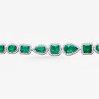 Peter Marco 18k white gold pear and cushion cut emerald with round cut diamond bangle, detail view