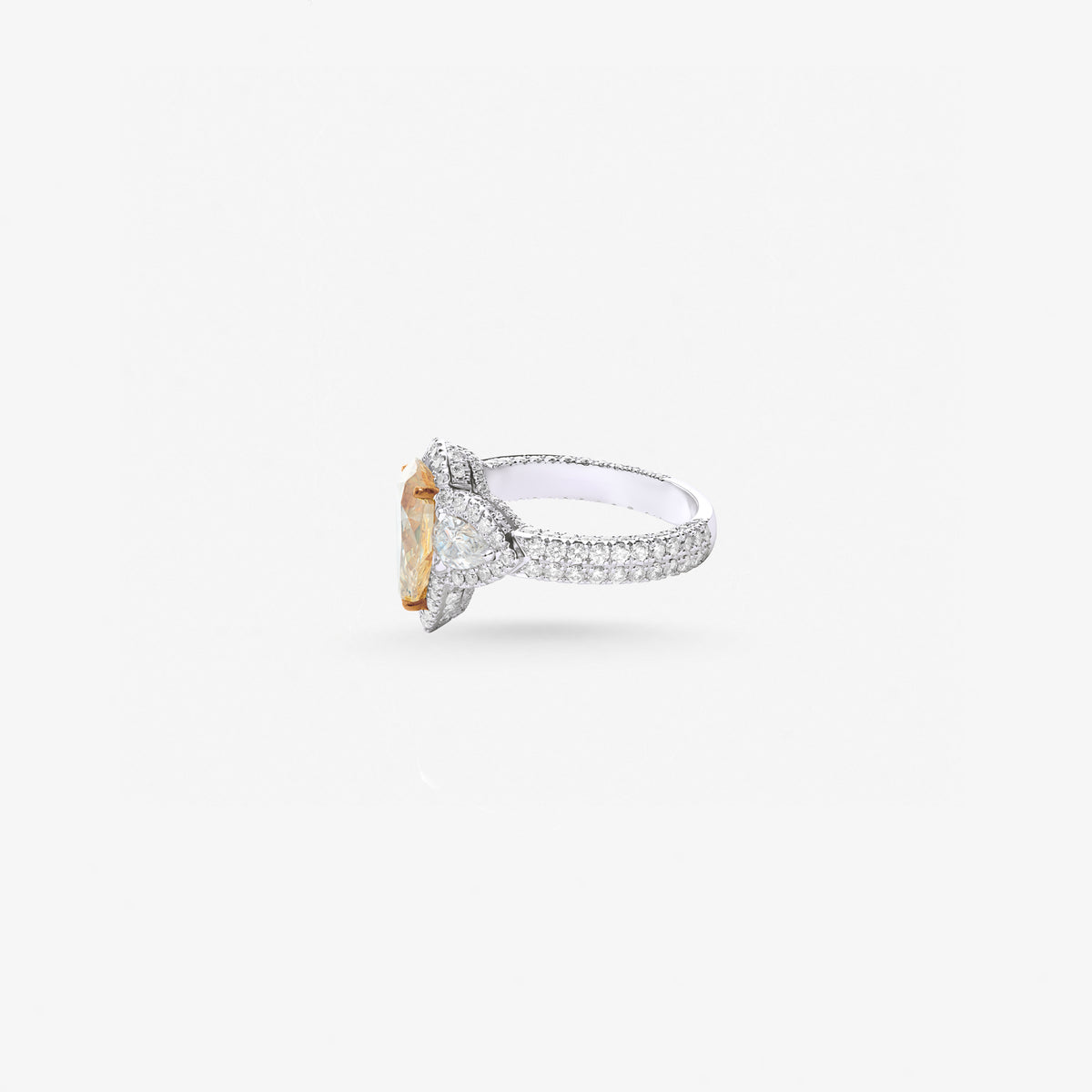 Peter Marco 18k white gold pear cut champagne diamond and pear cut diamond halo ring, side view
