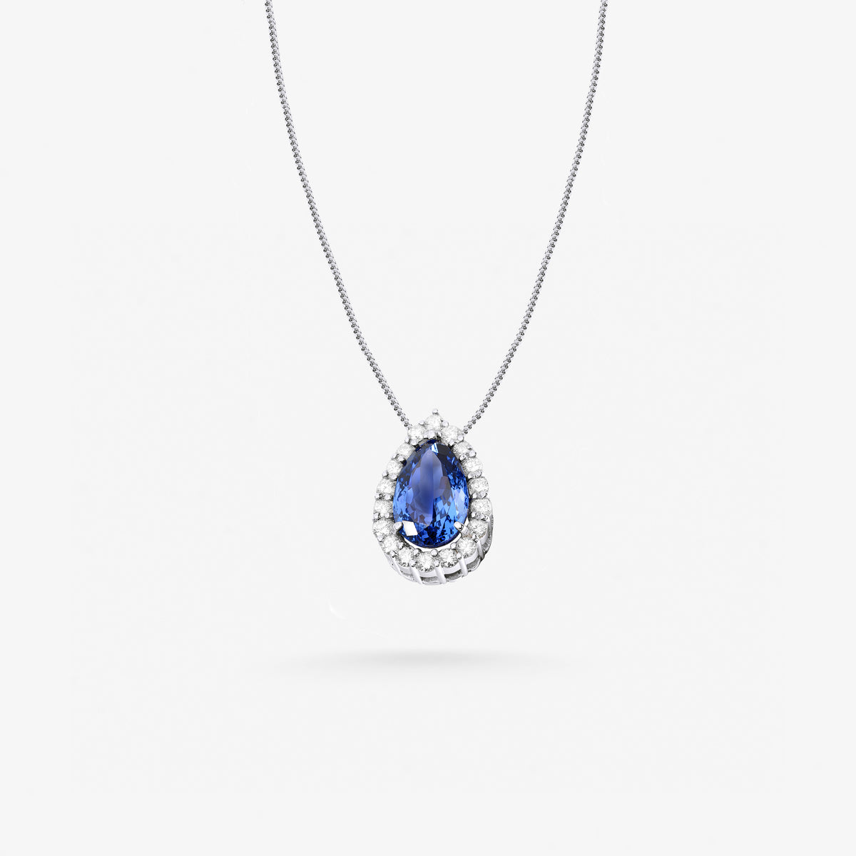 Peter Marco 18k white gold pear shaped blue sapphire and diamond pendant