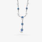 Peter Marco white gold round and pear cut blue sapphire and round cut diamond necklace
