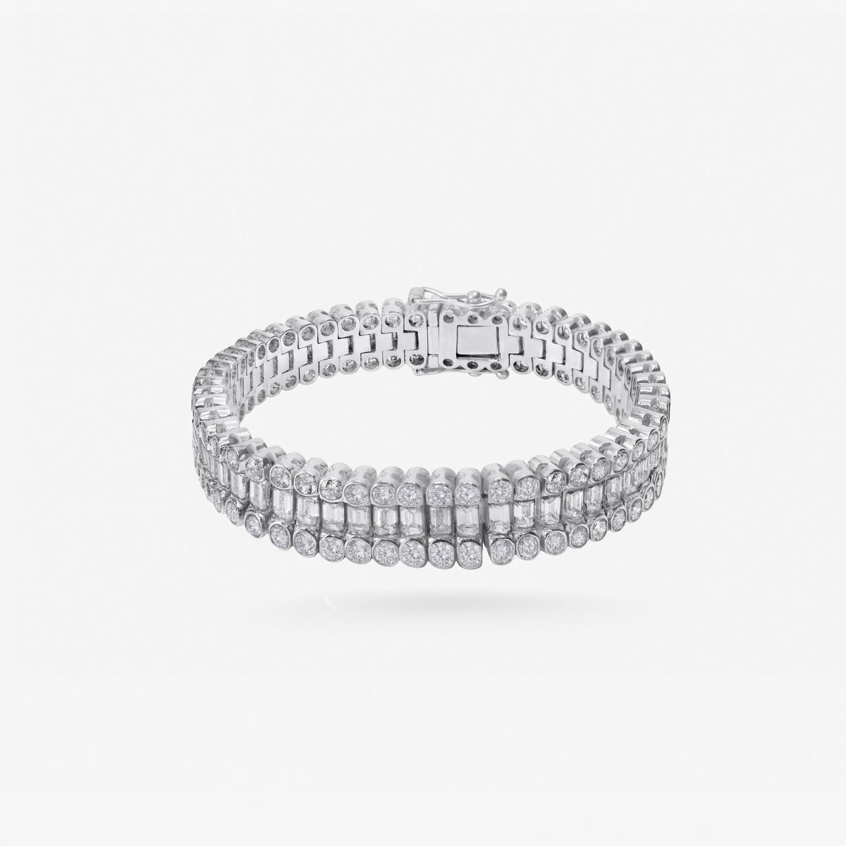 Peter Marco 18k white gold round cut and emerald cut diamond bracelet