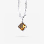 Peter Marco 18k white gold round cut and enstatite diamond pendant