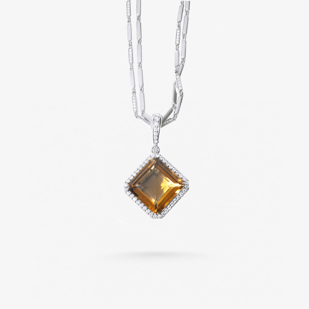 Peter Marco 18k white gold round cut and enstatite diamond pendant