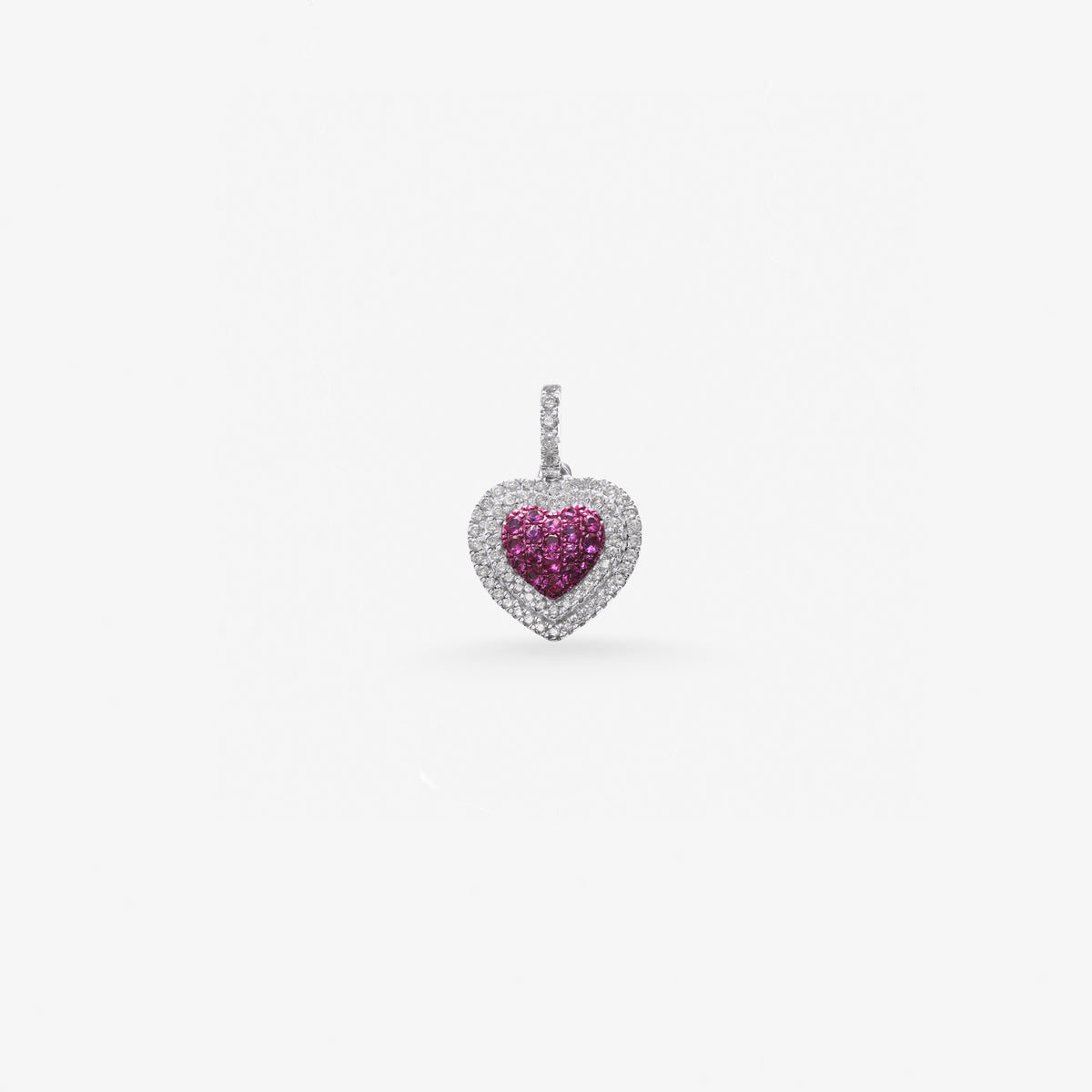 Peter Marco 18k white gold round cut diamond and pink sapphire heart, detail view