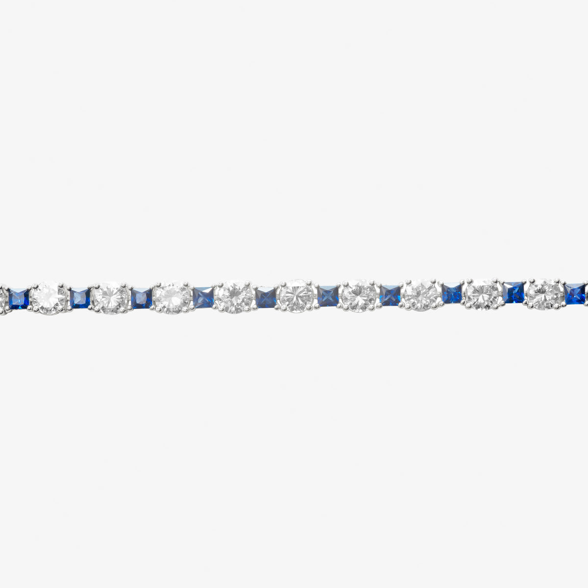 Peter Marco 18k white gold round cut diamond and princess cut sapphire bracelet, detail view