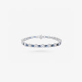 Peter Marco 18k white gold round cut diamond and princess cut sapphire bracelet