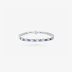 Peter Marco 18k white gold round cut diamond and princess cut sapphire bracelet