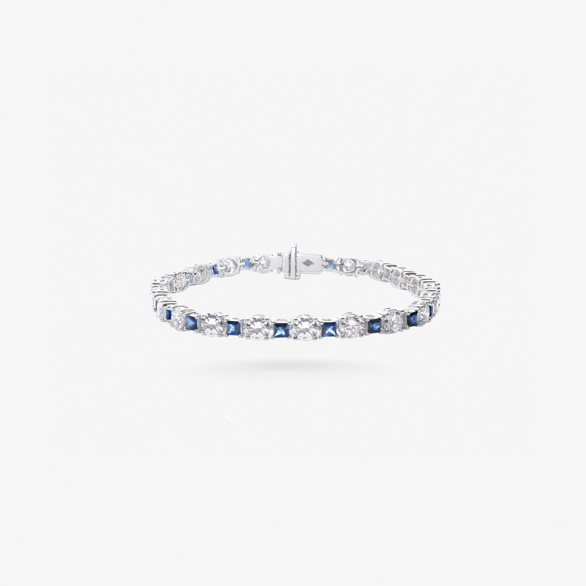 Peter Marco 18k white gold round cut diamond and princess cut sapphire bracelet