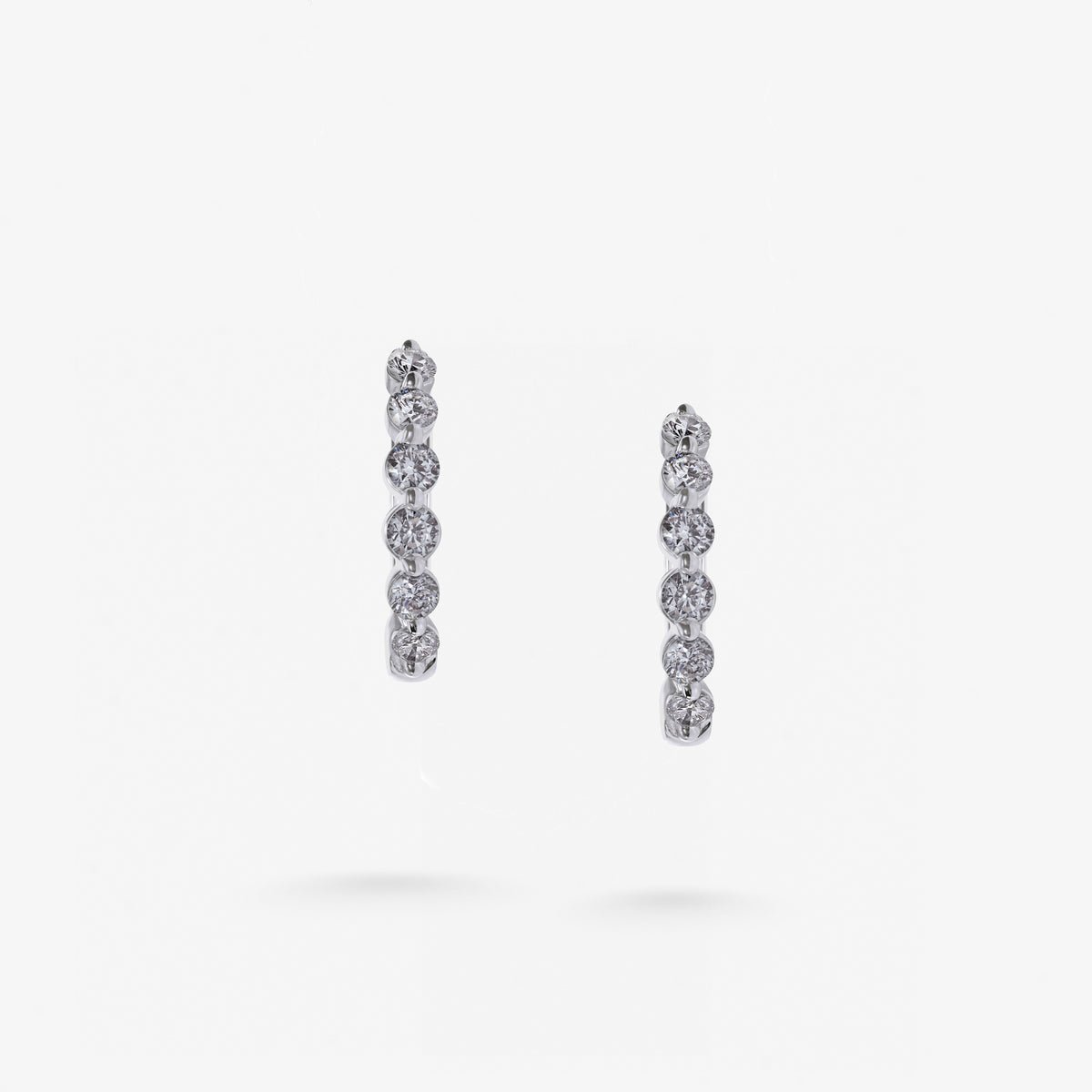 Peter Marco 18k white gold round cut diamond hoop earrings