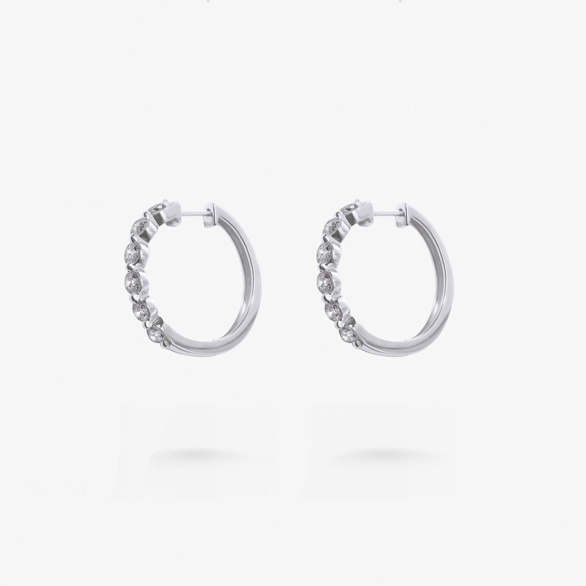 Peter Marco 18k white gold round cut diamond hoop earrings, side view
