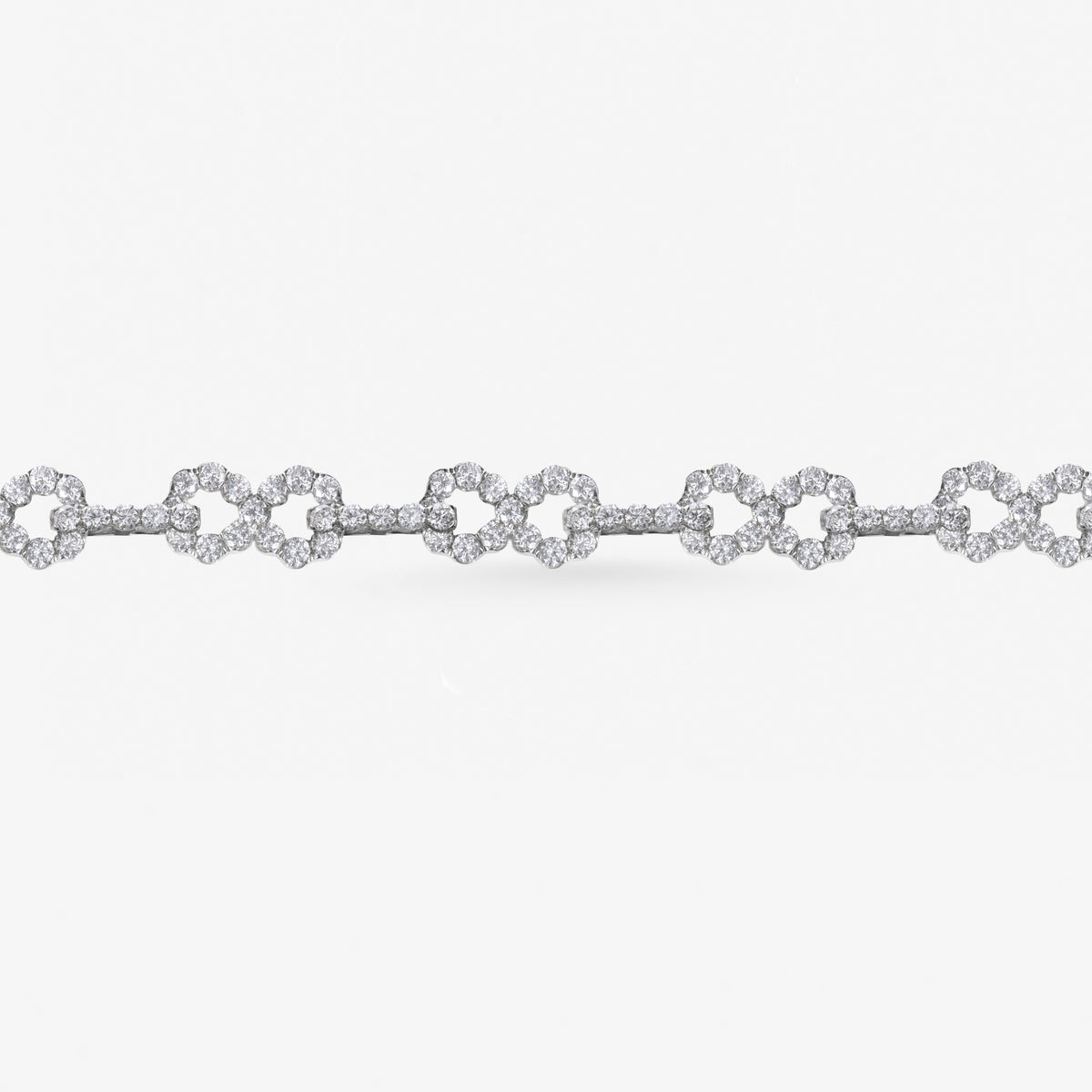 Peter Marco 18k white gold round cut diamond infinity link bracelet, detail view