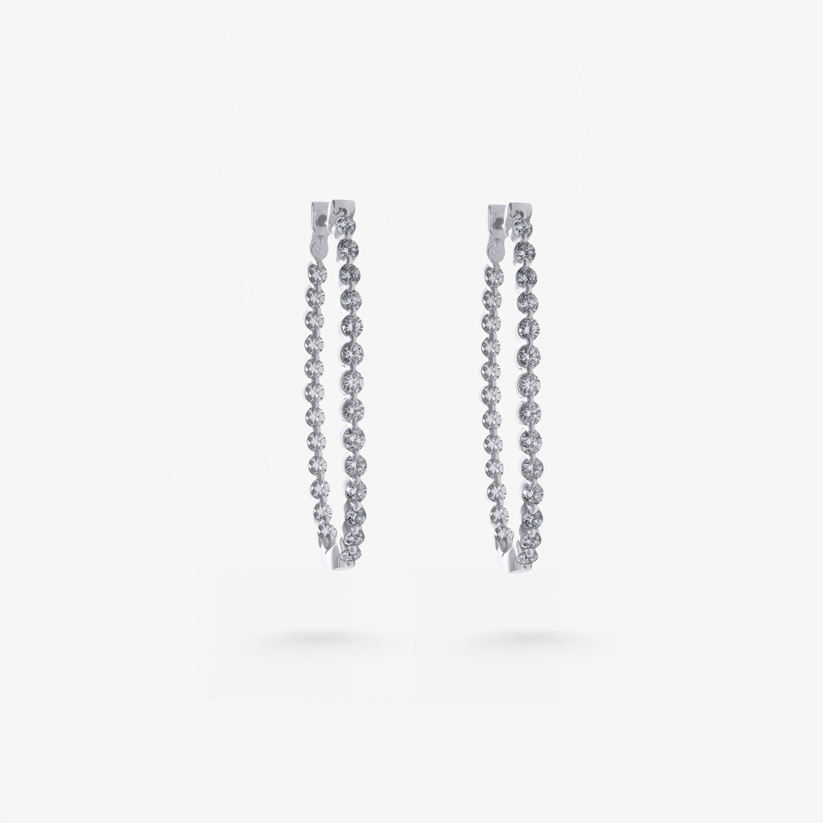 Peter Marco 18k white gold round cut diamond linear drop earrings, side view