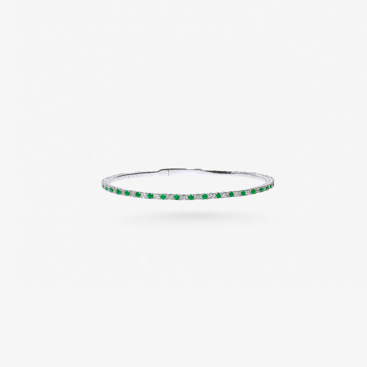 Peter Marco 18k white gold round cut emerald and diamond tennis bangle