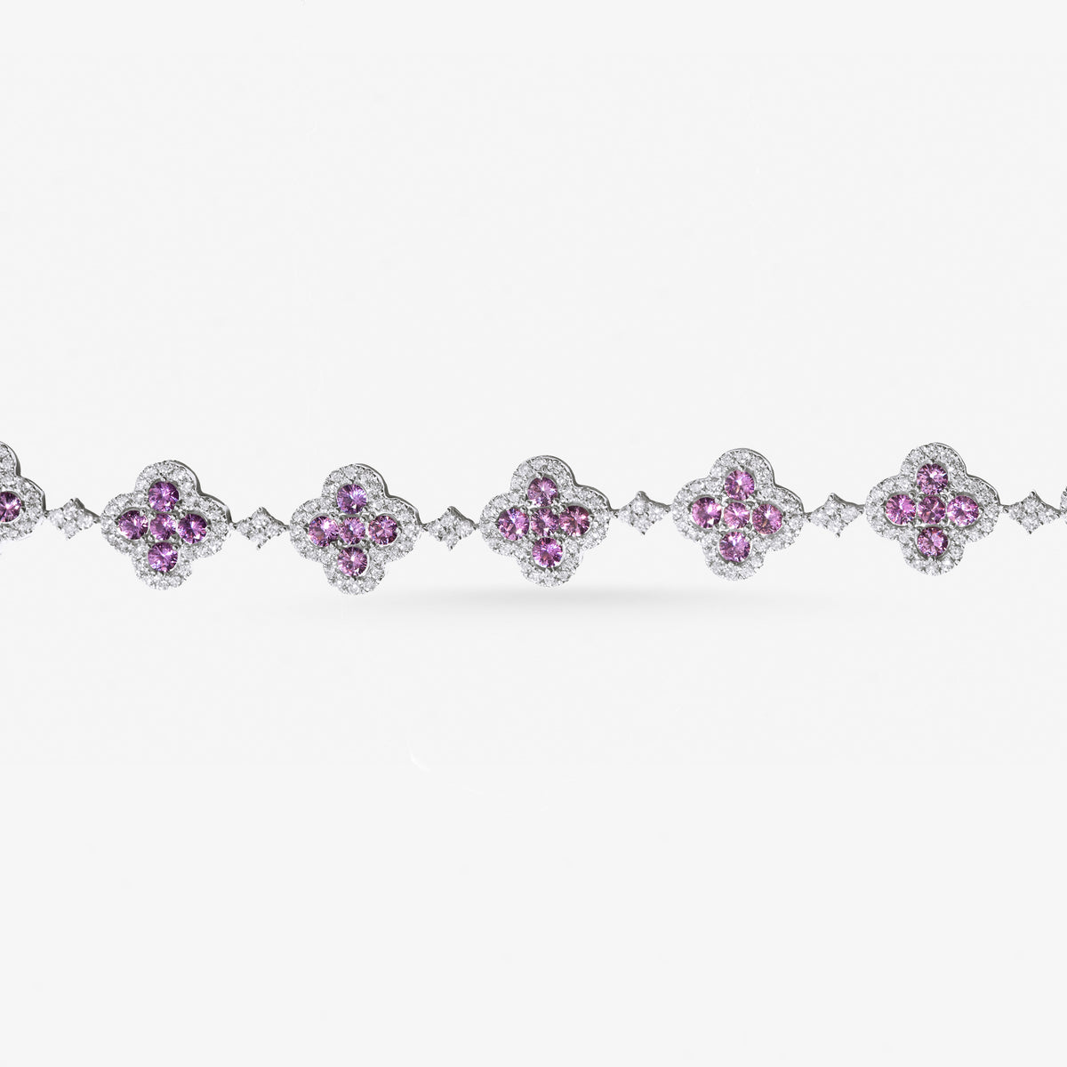 Peter Marco 18k white gold round cut pink sapphire and diamond flower necklace, detail view