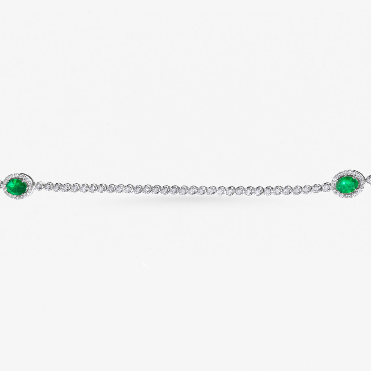 Peter Marco 18k-white gold round cut white diamond and oval cut emerald necklace, side view