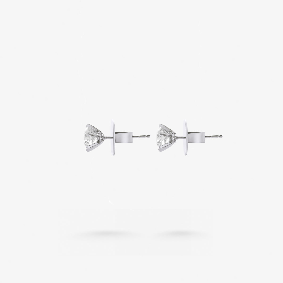 Peter Marco 18k white gold round cut white diamond stud earrings, side view