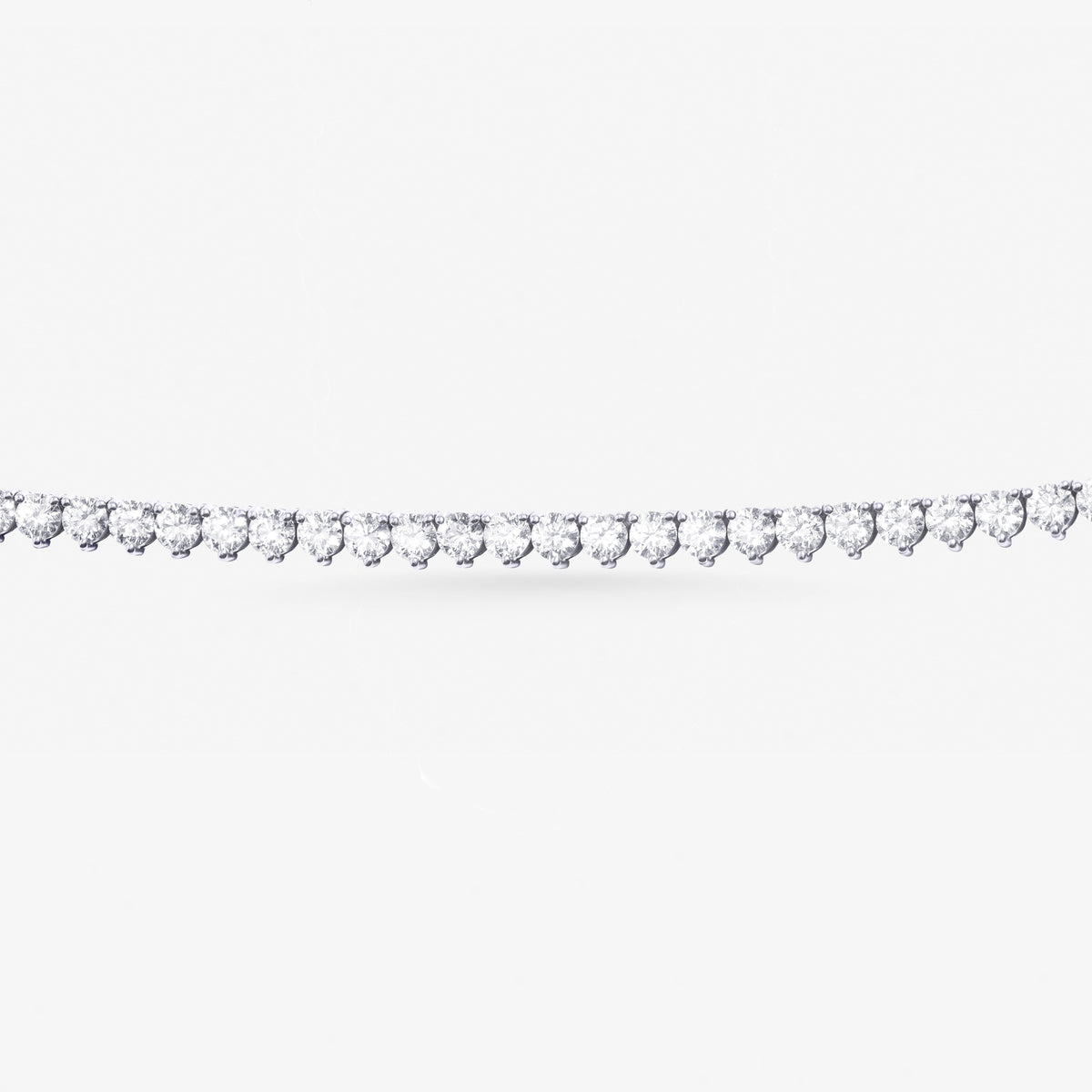 Peter Marco 18k white gold three-prong round cut diamond necklace, detail view