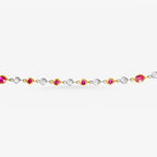 Peter Marco 18k yellow and white gold bezel set round cut diamond and ruby necklace, detail view