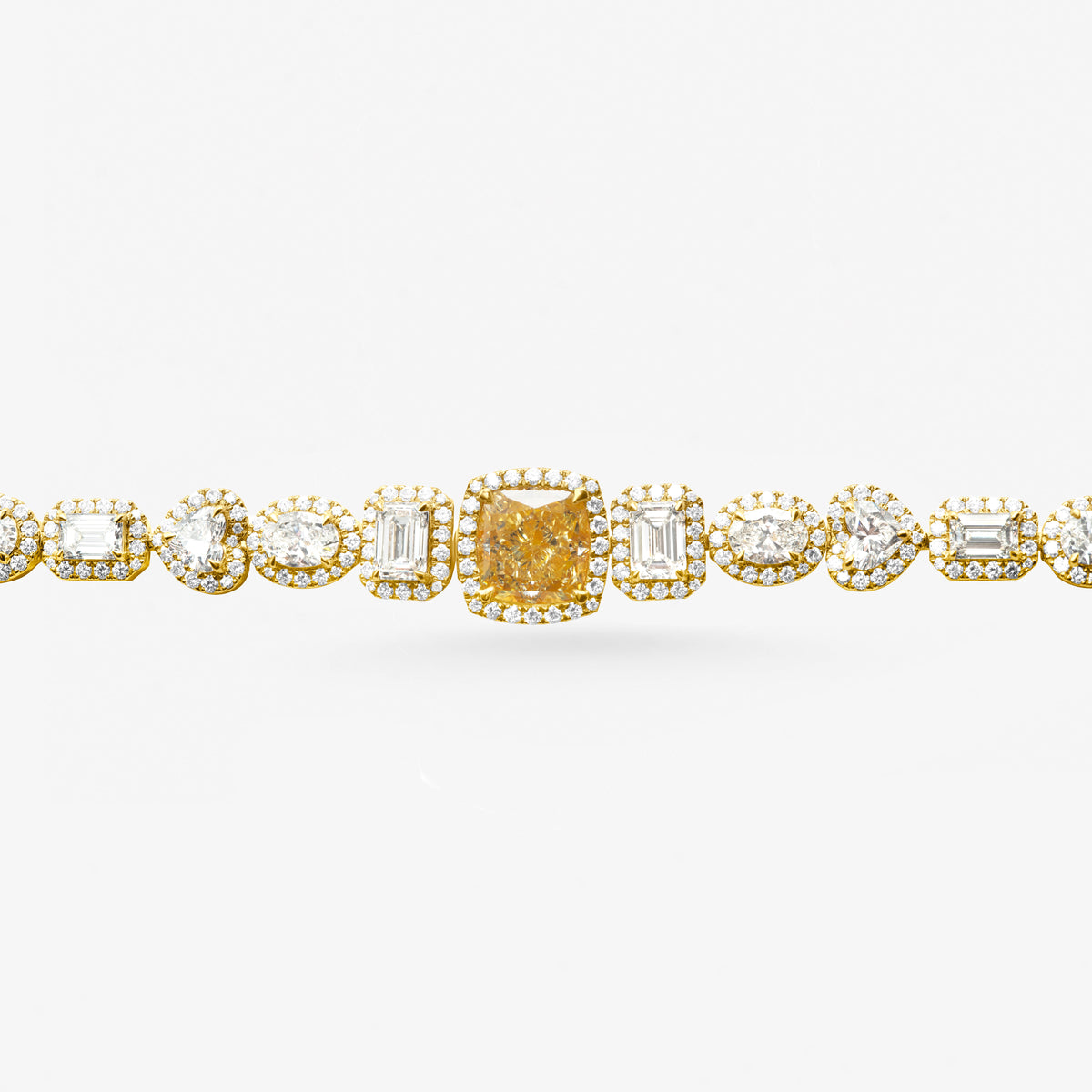 Peter Marco 18k yellow gold cushion, emerald and oval cut diamond bracelet, detail view