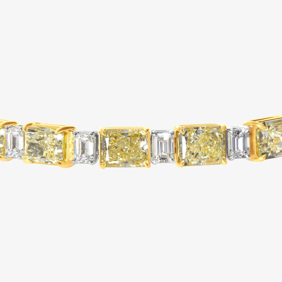18k-yellow-gold-cushion-emerald-and-oval-cut-diamond-bracelet