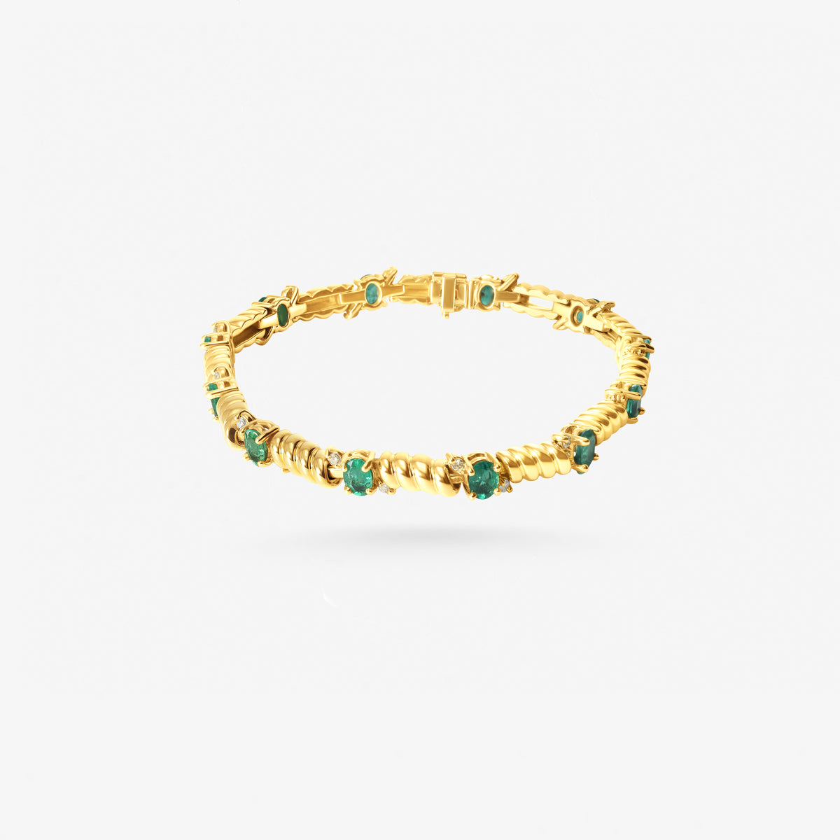 Peter Marco 18k yellow gold emerald cut emerald and round cut diamond bracelet