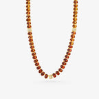 Peter Marco 18k yellow gold oval cut spessartite garnet and diamond necklace