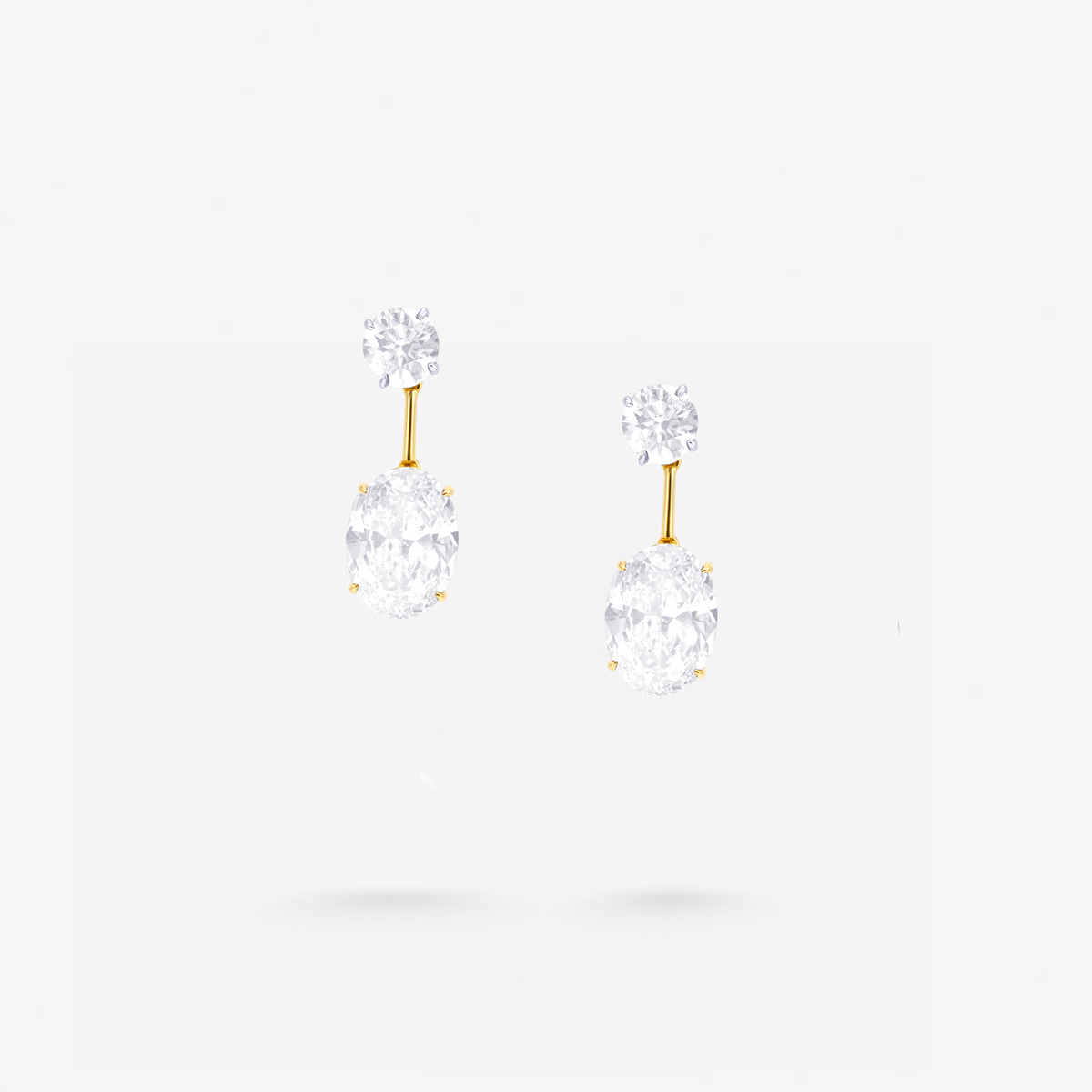 Peter Marco 18k yellow gold round and oval cut white diamond drop earrings