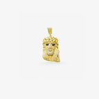 Peter Marco 18k yellow gold round cut diamond and black diamond jesus pendant, detail view