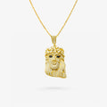 Peter Marco 18k yellow gold round cut diamond and black diamond jesus pendant 